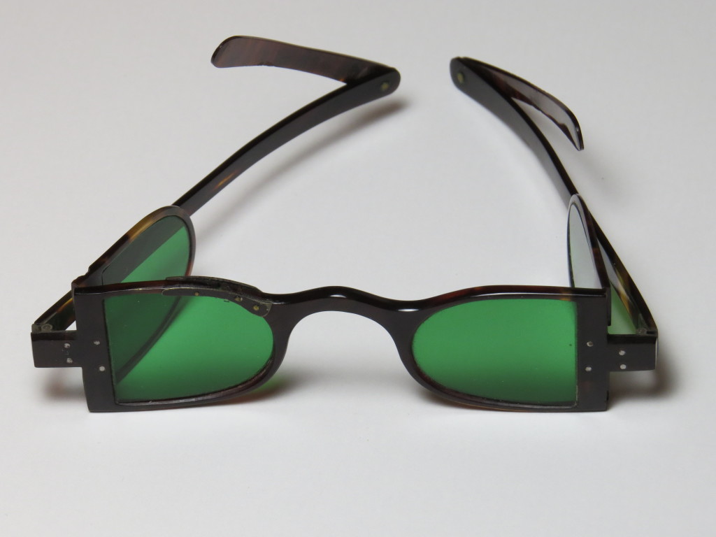 Tortoiseshell - Four lens - Tinted - Interesting silver repair to right upper part of frame.