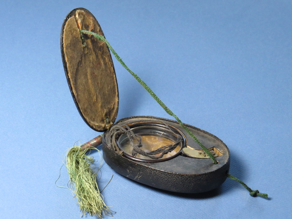 Folded wood spectacles in case